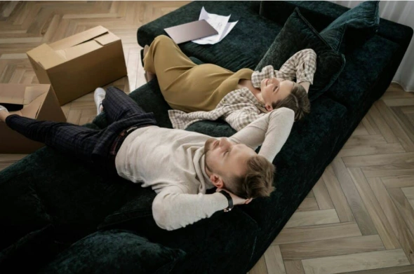couple sitting on a sofa