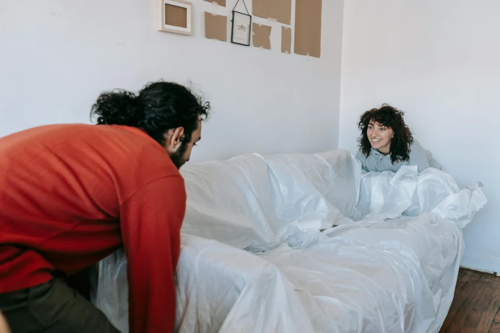 couple moving sofa