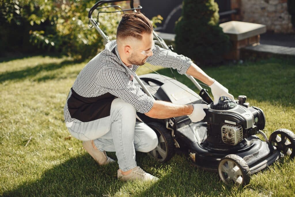 cleaning the lawn mower